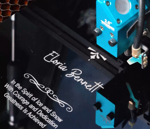 Engraving the winter olympic trophy