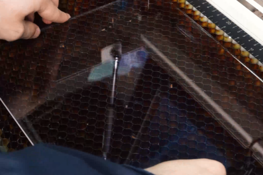 put the acrylic on the laser bed