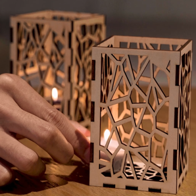 A well cut wooden candle holder