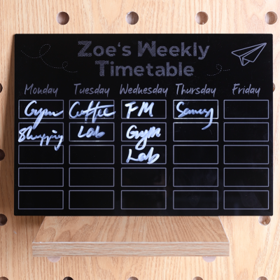 A well engraved acrylic weekly planner A well engraved acrylic weekly planner