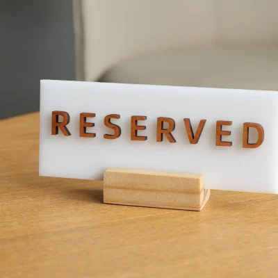 A well laser cut reserved sign