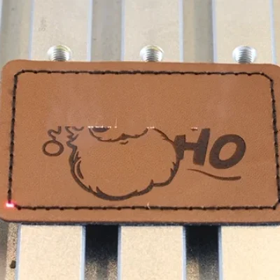 Laser engraving the leather label for hats