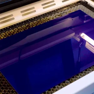 Put the acrylic onto the work bed