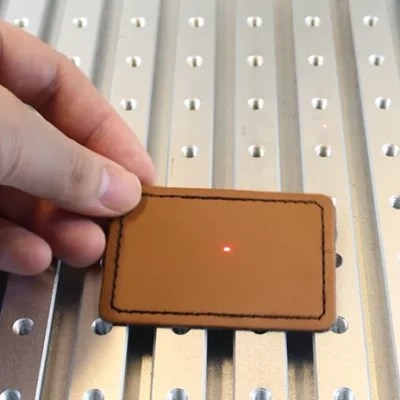 Put the leather on the work bed