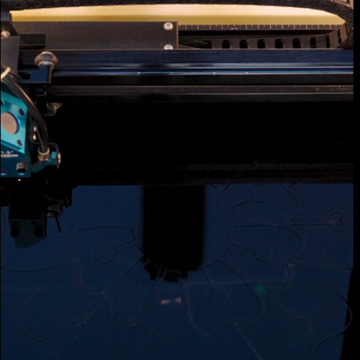 The thunder lacer bolt machine is cutting acrylic