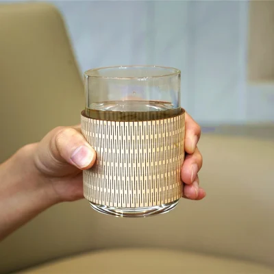 a beautiful laser cut wooden cup sleeve