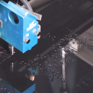 laser cutting the acrylic for making a wall art