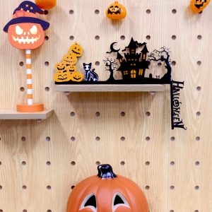 A well laser-cut halloween door decor made with thunder bolt
